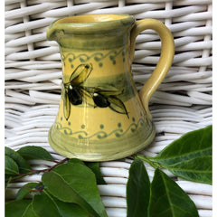 Provence Ceramic Creamer - Olives Light Yellow & Green
This hand made and hand painted ceramic creamer with an olives design will add a dash of Provence to your breakfast table. 
Height: 4"    
Product of France