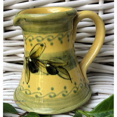 Provence Ceramic Creamer - Olives Light Yellow & Green
This hand made and hand painted ceramic creamer with an olives design will add a dash of Provence to your breakfast table. 
Height: 4"    
Product of France
