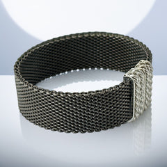 Signed Erica Zap bracelet in black nickel mesh with rhodium-plated magnetic clasp, 7-inch size, ¾-inch width, contemporary sculptural design, excellent condition.