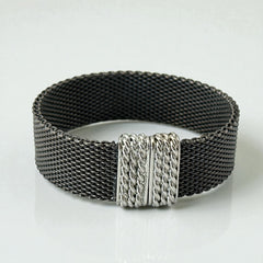 Signed Erica Zap bracelet in black nickel mesh with rhodium-plated magnetic clasp, 7-inch size, ¾-inch width, contemporary sculptural design, excellent condition.