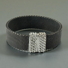 Signed Erica Zap bracelet in black nickel mesh with rhodium-plated magnetic clasp, 7-inch size, ¾-inch width, contemporary sculptural design, excellent condition.