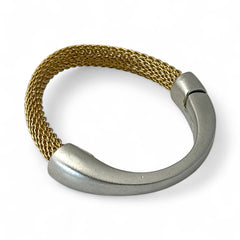 Signed Erica Zap bracelet featuring a woven 18K gold electroplated mesh band and a matte silver-tone crescent magnetic clasp. Artisan design with sculptural contrast between textures and tones. Shown from multiple angles to highlight clasp detail, mesh construction, and overall condition.