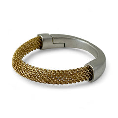 Signed Erica Zap bracelet featuring a woven 18K gold electroplated mesh band and a matte silver-tone crescent magnetic clasp. Artisan design with sculptural contrast between textures and tones. Shown from multiple angles to highlight clasp detail, mesh construction, and overall condition.