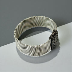 Erica Zap rhodium-plated mesh bracelet in black nickel finish with sculptural silhouette and magnetic clasp, likely new old stock.