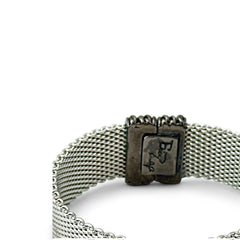 Erica Zap rhodium-plated mesh bracelet in black nickel finish with sculptural silhouette and magnetic clasp, likely new old stock.