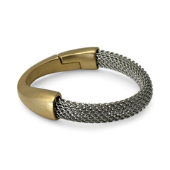 Signed Erica Zap bracelet featuring a rhodium-plated woven mesh band and a matte 18K gold electroplated crescent clasp. Sculptural magnetic closure with mixed-metal contrast. Shown from multiple angles to highlight clasp detail, mesh texture, and overall condition.