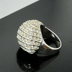 Vintage French silver-tone cocktail ring from the 1990s, featuring diagonal rows of clear pave rhinestones in a high rounded design, in very good vintage condition.