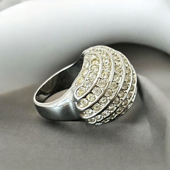 Vintage French silver-tone cocktail ring from the 1990s, featuring diagonal rows of clear pave rhinestones in a high rounded design, in very good vintage condition.
