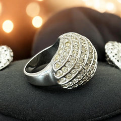 Vintage French silver-tone cocktail ring from the 1990s, featuring diagonal rows of clear pave rhinestones in a high rounded design, in very good vintage condition.