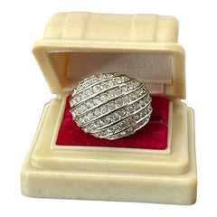 Vintage French silver-tone cocktail ring from the 1990s, featuring diagonal rows of clear pave rhinestones in a high rounded design, in very good vintage condition.