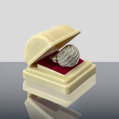 Vintage French silver-tone cocktail ring from the 1990s, featuring diagonal rows of clear pave rhinestones in a high rounded design, in very good vintage condition.