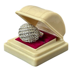 Vintage French silver-tone cocktail ring from the 1990s, featuring diagonal rows of clear pave rhinestones in a high rounded design, in very good vintage condition.