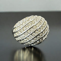 Vintage French silver-tone cocktail ring from the 1990s, featuring diagonal rows of clear pave rhinestones in a high rounded design, in very good vintage condition.