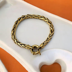 Vintage French wheat chain bracelet, gold-plated design from the 1980s, featuring an elegant oversized clasp for a bold yet refined statement