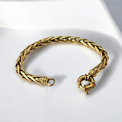 Vintage French wheat chain bracelet, gold-plated design from the 1980s, featuring an elegant oversized clasp for a bold yet refined statement