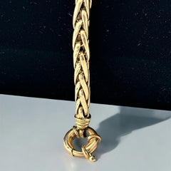 Vintage French wheat chain bracelet, gold-plated design from the 1980s, featuring an elegant oversized clasp for a bold yet refined statement