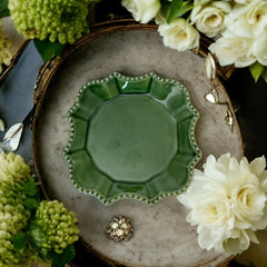 Moss green ceramic serving dish by California Pantry, vintage 2005, featuring scalloped edges and a beaded rim; ideal for Camembert cheese, nuts, or sweets; photographed in natural light to highlight glossy glaze and artisanal details.
