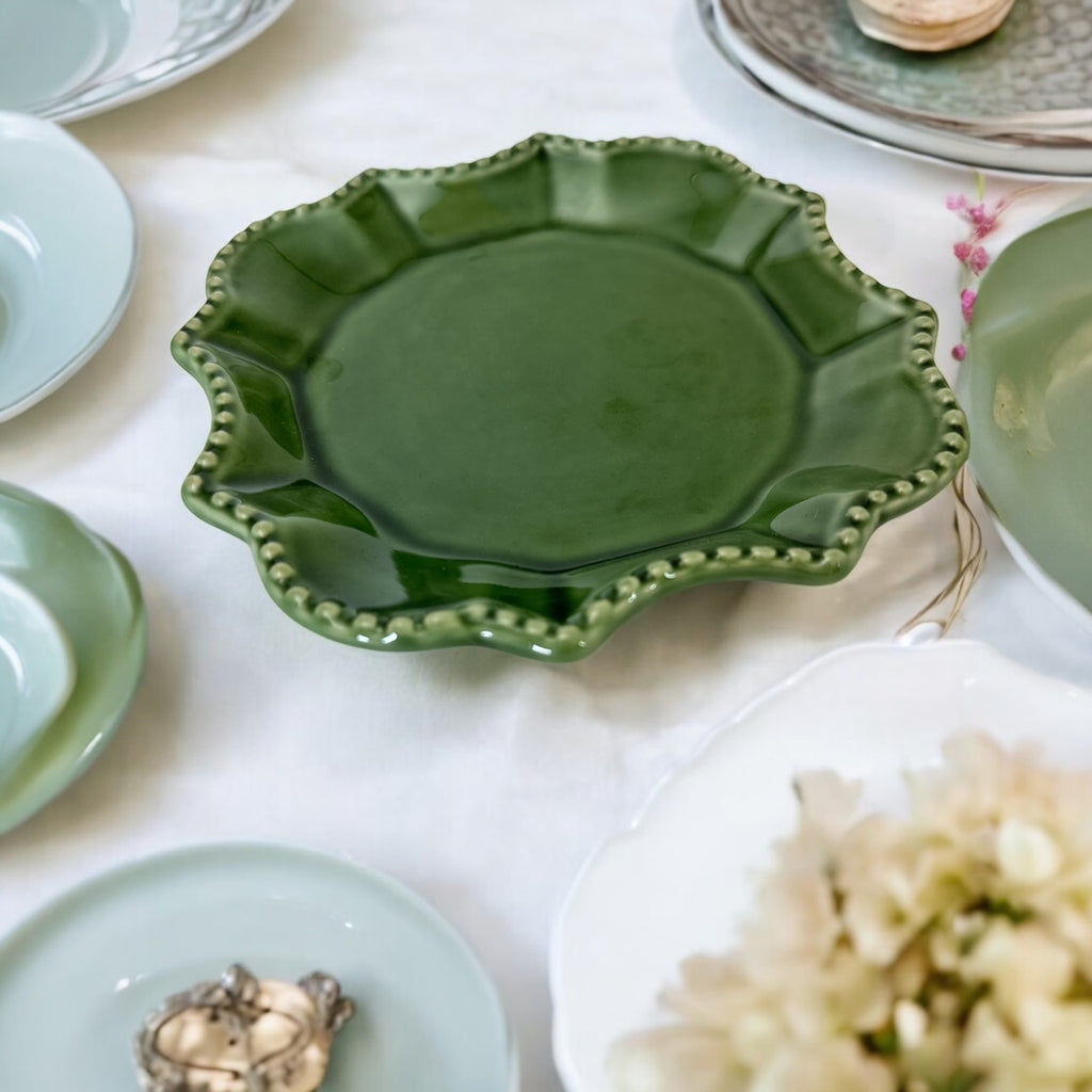 Moss green ceramic serving dish by California Pantry, vintage 2005, featuring scalloped edges and a beaded rim; ideal for Camembert cheese, nuts, or sweets; photographed in natural light to highlight glossy glaze and artisanal details.