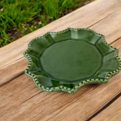 Moss green ceramic serving dish by California Pantry, vintage 2005, featuring scalloped edges and a beaded rim; ideal for Camembert cheese, nuts, or sweets; photographed in natural light to highlight glossy glaze and artisanal details.