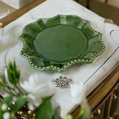 Moss green ceramic serving dish by California Pantry, vintage 2005, featuring scalloped edges and a beaded rim; ideal for Camembert cheese, nuts, or sweets; photographed in natural light to highlight glossy glaze and artisanal details.