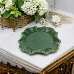 Moss green ceramic serving dish by California Pantry, vintage 2005, featuring scalloped edges and a beaded rim; ideal for Camembert cheese, nuts, or sweets; photographed in natural light to highlight glossy glaze and artisanal details.
