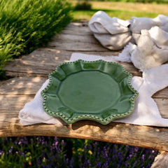 Moss green ceramic serving dish by California Pantry, vintage 2005, featuring scalloped edges and a beaded rim; ideal for Camembert cheese, nuts, or sweets; photographed in natural light to highlight glossy glaze and artisanal details.