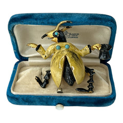 Signed Hattie Carnegie vintage bug brooch with yellow enamel coat, black top hat, turquoise cabochons, and gold-tone details—whimsical mid-century costume jewelry