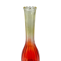 Vintage Jeannette Glass vase with ombre Amberina coloring and fluted design, styled with complementary flowers and soft lighting to highlight its texture, color gradient, and collectible charm.