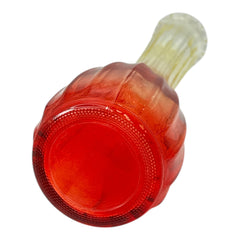Vintage Jeannette Glass vase with ombre Amberina coloring and fluted design, styled with complementary flowers and soft lighting to highlight its texture, color gradient, and collectible charm.