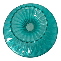 A vibrant aqua blue pressed glass footed dish with a diamond pattern, versatile for serving desserts, fruit, or candy, mid-century design.