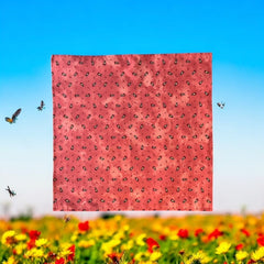 Provence cotton napkins featuring a rust orange background with red and yellow floral designs from Marat d’Avignon Tradition Collection, made of 100% cotton, measuring 18" x 18", with vibrant, fade-resistant prints. Made in France.