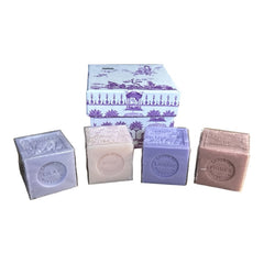 Purple Toile de Jouy gift box featuring intricate patterns, containing four artisanal Marseille cube soaps in Lilac, Lavender, Fig, and Rose fragrances.