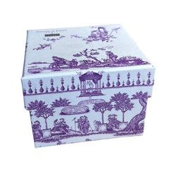 Purple Toile de Jouy gift box featuring intricate patterns, containing four artisanal Marseille cube soaps in Lilac, Lavender, Fig, and Rose fragrances.