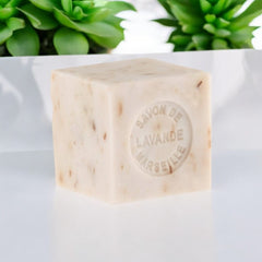 Mini Marseille soap with lavender flowers for natural exfoliation, crafted in France using traditional craftsmanship, 3.5 oz natural and biodegradable soap bar for sensitive skin.
