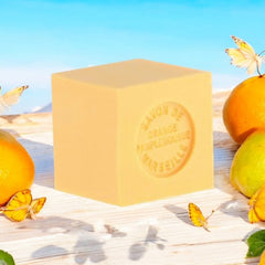 Mini Marseille soap with orange and grapefruit scent, crafted in France using traditional craftsmanship, 3.5 oz natural and biodegradable soap bar for sensitive skin.