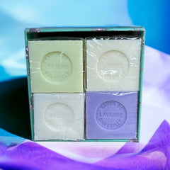 Green Toile de Jouy gift box featuring intricate patterns, containing four artisanal Marseille cube soaps in Lily of the Valley, Lavender, Verbena, and Jasmine fragrances.