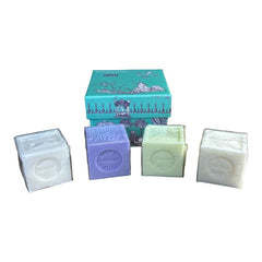 Green Toile de Jouy gift box featuring intricate patterns, containing four artisanal Marseille cube soaps in Lily of the Valley, Lavender, Verbena, and Jasmine fragrances.