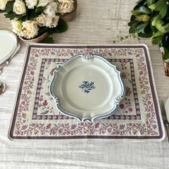 Provence Jacquard Montespan Collection placemat from Tissus Toselli, featuring a pink floral design on a cream-colored background, woven with intricate patterns inspired by old Provencal fabrics, measuring 19" x 15", photographed showcasing its elegant and refined craftsmanship