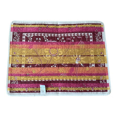 Provence Jacquard Montespan Collection placemat from Tissus Toselli, featuring a pink floral design on a cream-colored background, woven with intricate patterns inspired by old Provencal fabrics, measuring 19" x 15", photographed showcasing its elegant and refined craftsmanship