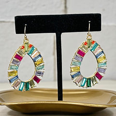 Christian Siriano New York teardrop dangle earrings with multicolor baguette-cut cubic zirconia stones in a vibrant, symmetrical design.