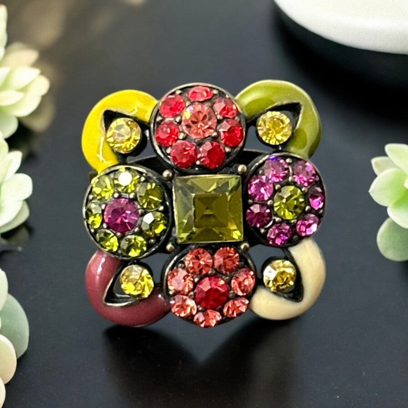 Adjustable brass ring with multicolor enamel leaves and rhinestone floral motifs, featuring vibrant hues of red, pink, green, purple, moss green, cream, and yellow, in very good second-hand condition.