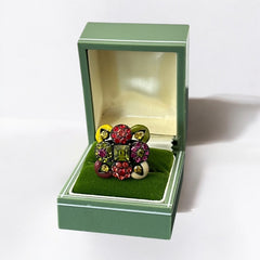 Adjustable brass ring with multicolor enamel leaves and rhinestone floral motifs, featuring vibrant hues of red, pink, green, purple, moss green, cream, and yellow, in very good second-hand condition.