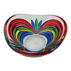 A small, triangular vintage Murano glass trinket dish from the 1990s, featuring vibrant red, green, blue, and yellow colors. The multicolored Venetian glass dish has a tiny chip on the rim but remains a striking and functional decorative piece.