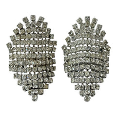 Pair of vintage 1950s Musi clear rhinestone chain shoe clips with an elongated shape, featuring triangular details at the top and bottom. The top rhinestone chains are soldered, while the bottom section moves for added sparkle. Signed 'Musi' on the back, in very good vintage condition with one slightly darkened rhinestone.