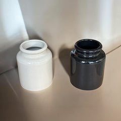 French stoneware jar from Meaux in excellent condition, available in off-white natural or black color, featuring a rustic and versatile design suitable for holding utensils, fresh herbs, small bouquets, storing food, or as a cooking salt cellar.