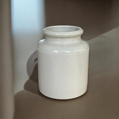 French stoneware jar from Meaux in excellent condition, available in off-white natural or black color, featuring a rustic and versatile design suitable for holding utensils, fresh herbs, small bouquets, storing food, or as a cooking salt cellar.