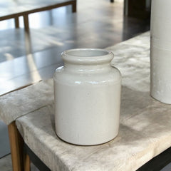French stoneware jar from Meaux in excellent condition, available in off-white natural or black color, featuring a rustic and versatile design suitable for holding utensils, fresh herbs, small bouquets, storing food, or as a cooking salt cellar.