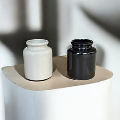 French stoneware jar from Meaux in excellent condition, available in off-white natural or black color, featuring a rustic and versatile design suitable for holding utensils, fresh herbs, small bouquets, storing food, or as a cooking salt cellar.