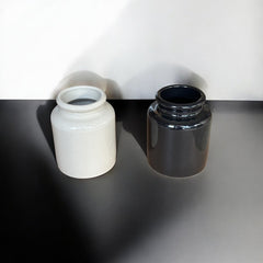 French stoneware jar from Meaux in excellent condition, available in off-white natural or black color, featuring a rustic and versatile design suitable for holding utensils, fresh herbs, small bouquets, storing food, or as a cooking salt cellar.