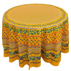 Round Provence-style cotton tablecloth by Le Cluny, featuring a vibrant yellow background with detailed mimosa and black olive patterns. Measures 70 inches in diameter, made in France, suitable for indoor and outdoor use, and machine washable for easy care.